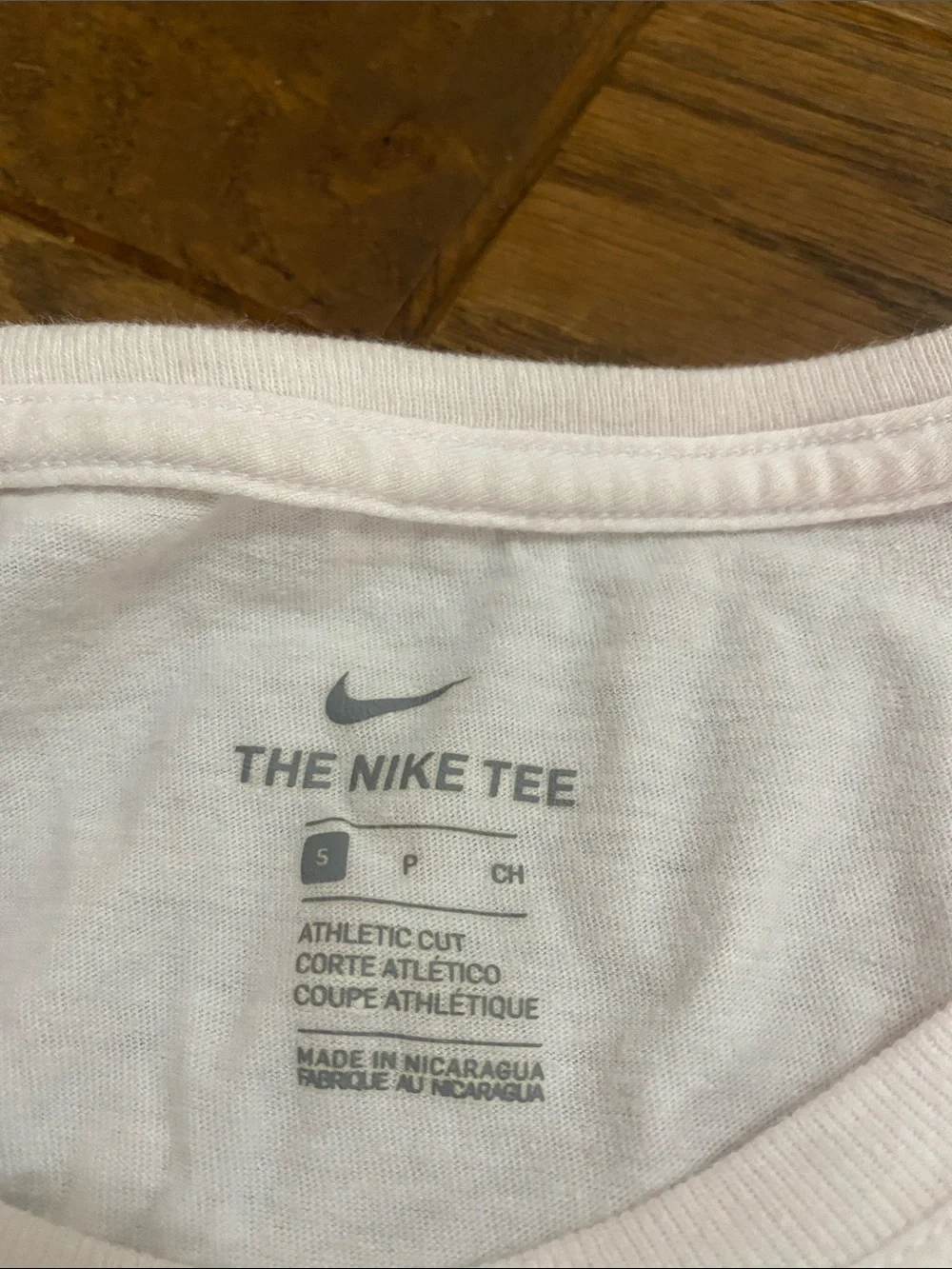 Nike Light Pink Cropped Tee with Grey Striped Logo
